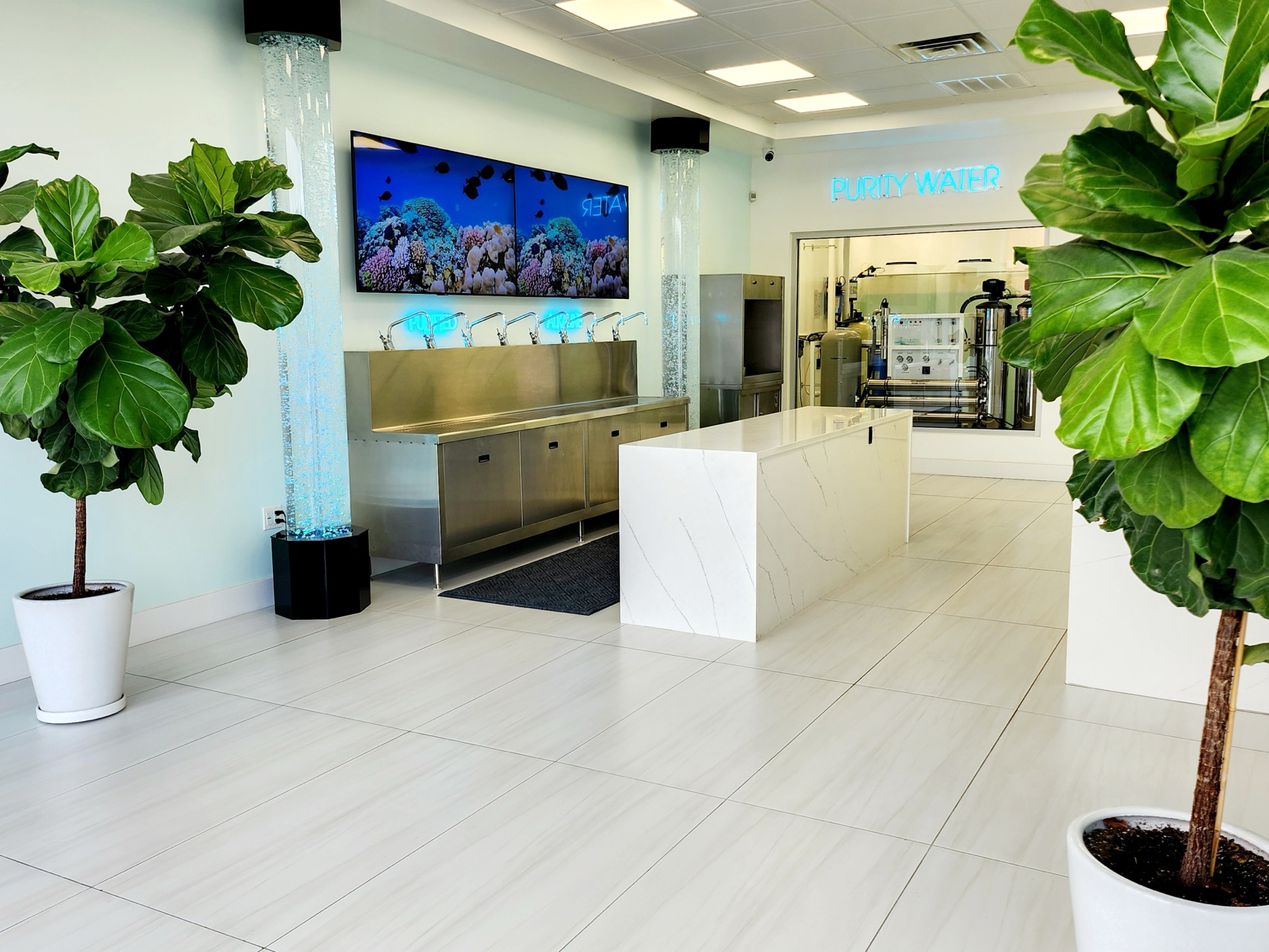 Interior of a Purity Water refill store with refill taps and treatment equipment